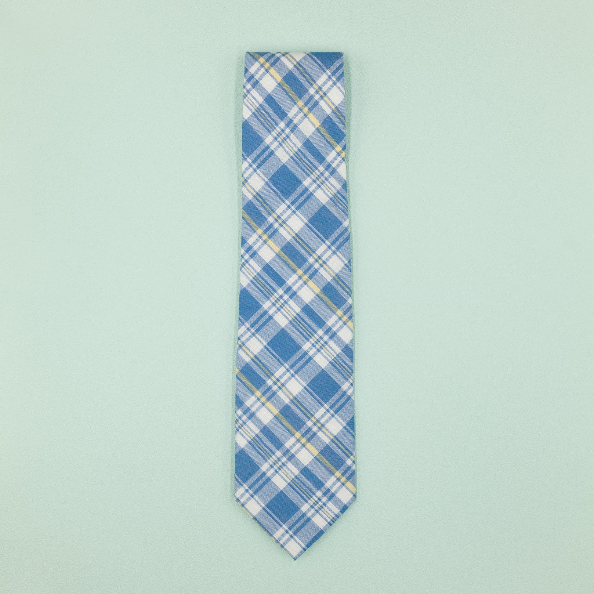 ライトブルーのマドラスチェック柄プレッピーネクタイ｜FOURBUTTONS Necktie - FOURBUTTONS ONLINE