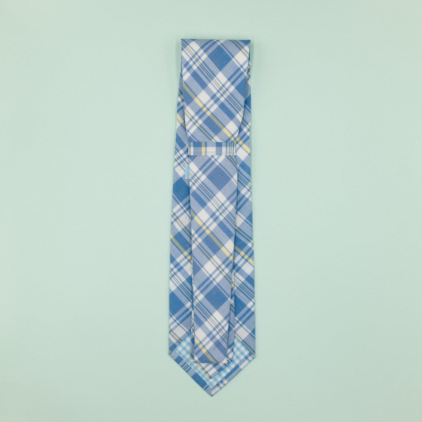 ライトブルーのマドラスチェック柄プレッピーネクタイ｜FOURBUTTONS Necktie - FOURBUTTONS ONLINE