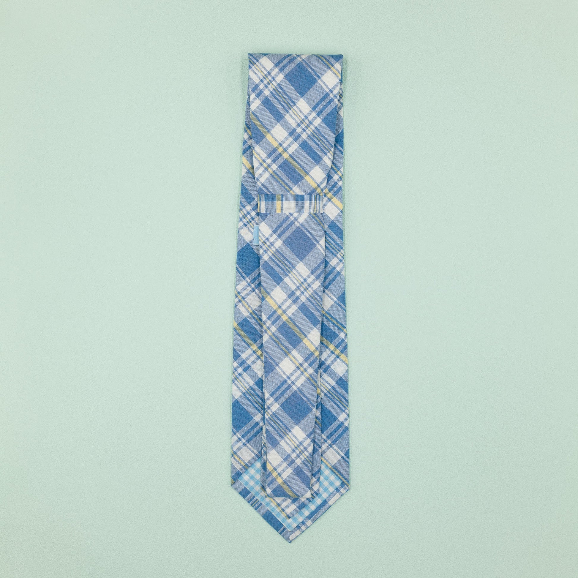 ライトブルーのマドラスチェック柄プレッピーネクタイ｜FOURBUTTONS Necktie - FOURBUTTONS ONLINE