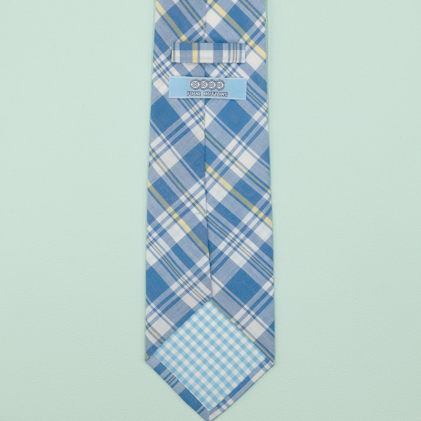 ライトブルーのマドラスチェック柄プレッピーネクタイ｜FOURBUTTONS Necktie - FOURBUTTONS ONLINE