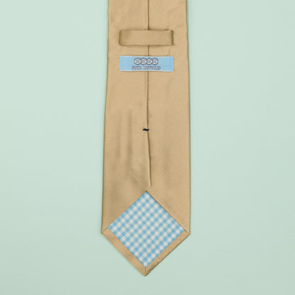 シャンパンゴールドの無地トゥルーソリッドネクタイ｜FOURBUTTONS Necktie - FOURBUTTONS ONLINE